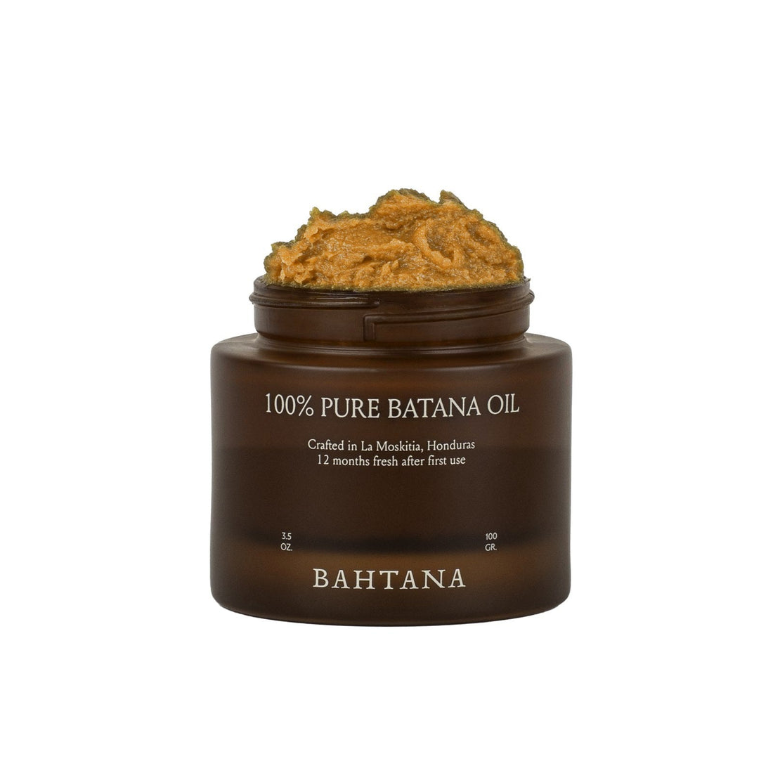 An open 1.8 oz jar of BAHTANA raw batana paste